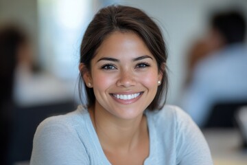 Positive secretary smiling to camera during meeting