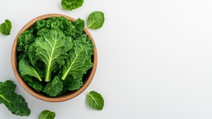 Obraz premium Close-up of raw kale, with a few leaves scattered artistically, showcasing their natural beauty 