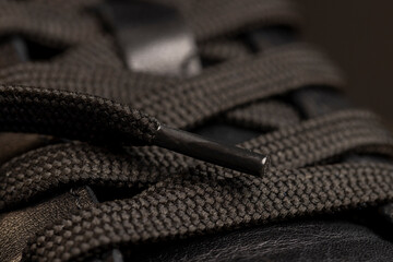 black synthetic laces for tying shoes