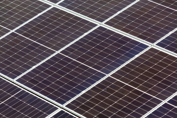  Close-up of solar panels in sunlight showcasing renewable energy and sustainable technology innovation