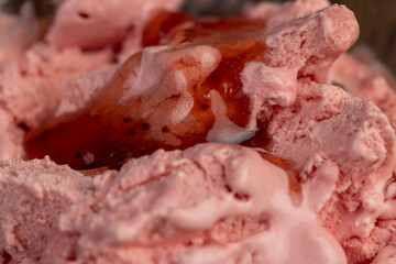 natural ice cream with strawberry flavor and fresh strawberry jam