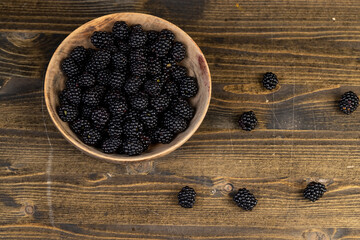 sour but ripe blackberries on the table