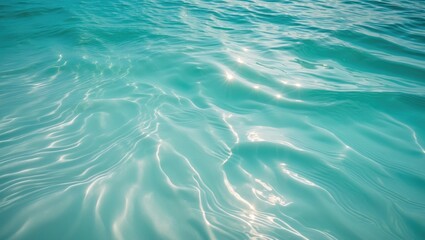 Obraz premium Aquamarine ocean scenery. Turquoise backdrop of clear seawater. Perfect summer getaway. Undulating surface. Ocean water surface. Rippled water of the ocean. Backyard pool gatherings.