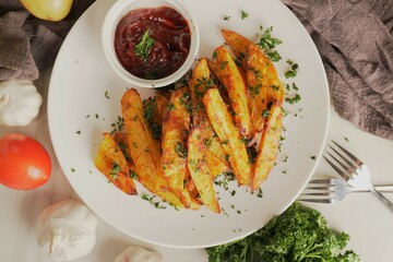 Golden of baked potatoes, seasoned with paprika and garlic, topped with fresh parsley and rich tomato sauce an irresistible homemade dish served fresh from the oven.