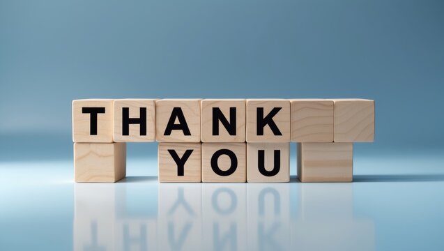 Thank you symbol, wooden blocks displaying thank you text, business and gratitude concept, area for text.