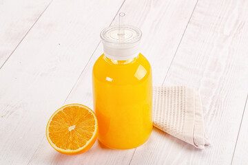 Sweet fresh orange juice in the glass