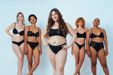 Multiethnic group of women wearing underwear with diverse kind of bodies, concepts about body...