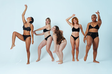 Multiethnic group of women wearing underwear with diverse kind of bodies, concepts about body...