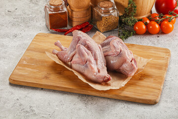 Raw gurmet quail bird preparation