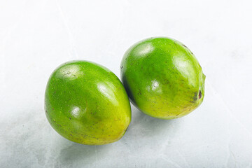 Two ripe green exotic avocado fruit