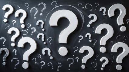 Many question marks on the chalkboard.