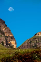 The moon over Drakensberg mountains, South Africa