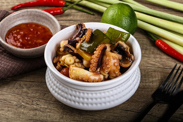 Roasted octopus with vegetables and oil