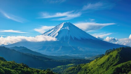Stunning perspective of the snowy peak set against a clear blue sky with a few clouds observed from the outskirts.