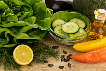 Beautiful fresh vegetables on the table. Preparation of salad. Vegetable slices