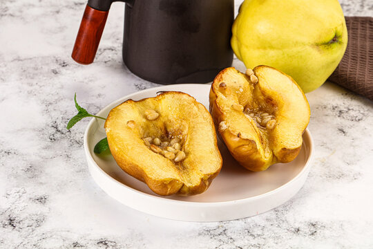 Baked quince with honey and cedar