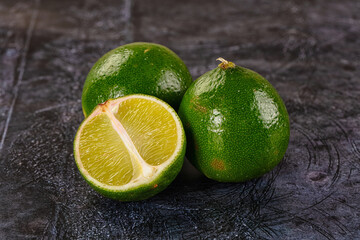 Ripe ggeen juicy lime heap