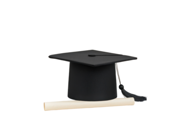black graduation cap with tassel is placed next to rolled diploma, symbolizing academic achievement and success. image conveys sense of accomplishment and celebration
