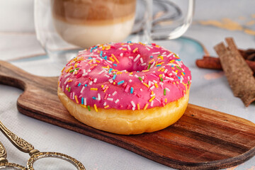 Sweet donut with strawberry icing