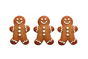 Three smiling gingerbread cookies with white icing details are arranged in row, showcasing their festive and cheerful appearance