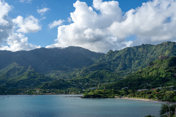 Taiohae Bay and town with anchored sailboats in Nuku Hiva, Marquesas Islands, French Polynesia