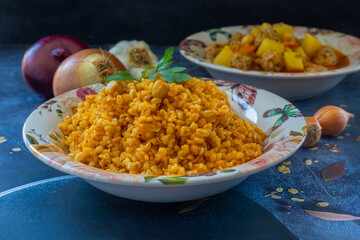 Traditional Turkish bulgur pilaf in a plate (Turkish name; Chickpea bulgur pilaf)