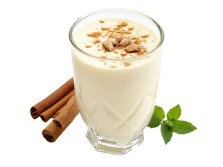 Creamy beverage served in a glass with spices and nuts on a transparent background, cut out