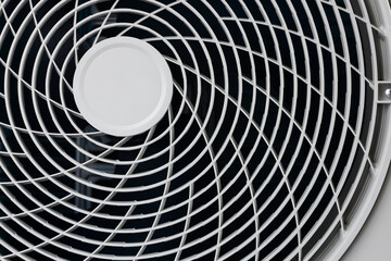 close up of air conditioner texture. Air condition cover texture. Gray protective plastic cover for air conditioner fan.