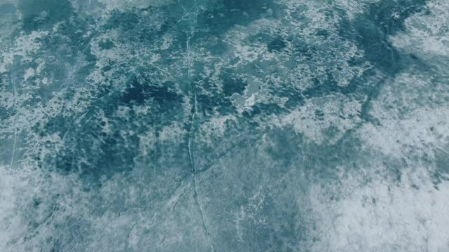 aerial footage of Krafla frozen crater lake in iceland