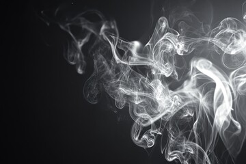 Ethereal smoke plumes dance in the dark creating a mesmerizing abstract display of light and shadow against a black background