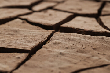 Dry cracked ground as background, closeup. Global warming