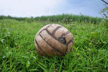 Damaged ball with peeling skin. Volleyball