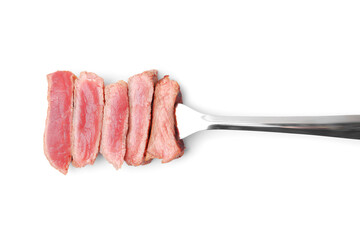 Delicious sliced beef tenderloin with different degrees of doneness isolated on white, top view