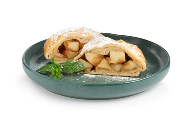 Pieces of tasty apple strudel with powdered sugar and mint isolated on white