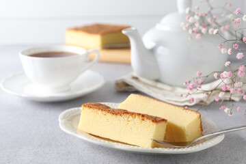 Tasty Japanese Castella sponge cake served on light table, closeup