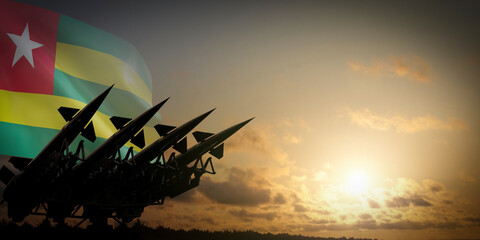 Flag of Togo and missiles - defense concept - 3D illustration