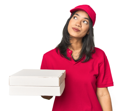 Latina delivering pizza, studio setup dreaming of achieving goals and purposes