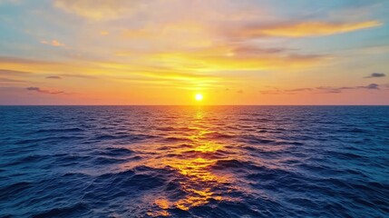 Obraz premium Sunset over ocean landscapes concept. Breathtaking sunset over calm ocean waves, reflecting vibrant warm colors.