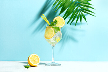 Glass of summer spritz cocktail with mint and lemon