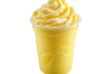 Creamy yellow dessert in a cup with swirls and smooth texture