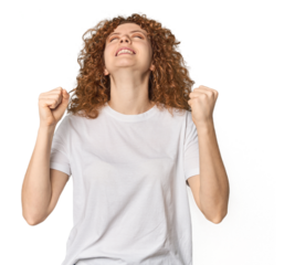 Young Caucasian redhead woman celebrating a victory, passion and enthusiasm, happy expression.