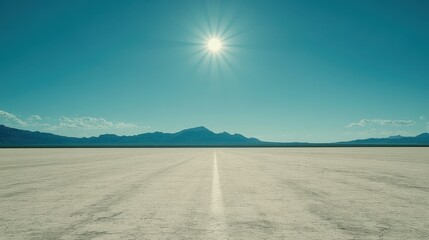 Fototapeta premium Vast Expanse of Bonneville Salt Flats Under a Bright Sun: A Scenic Landscape Photo