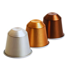 Metallic Espresso Pods Gold, Bronze, and White Coffee Capsules Closeup