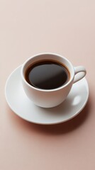 Obraz premium Freshly Brewed Black Coffee in a White Ceramic Cup on Saucer