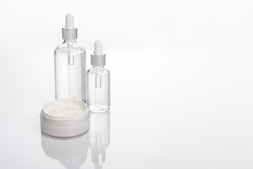 transparent dropper bottle with white background