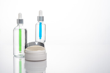 transparent dropper bottle with white background