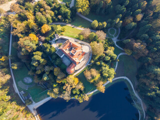 Top view of amazing autumn view of majestic old castle and lake of Trakoscan in Zagorje, northern Croatia