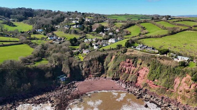 Aerial view of Maidencombe Beach in Devon orbiting