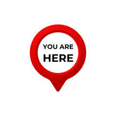 A simple red location pin with the phrase you are here in bold capital letters inside it.