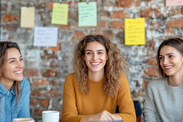 Fototapeta premium Smiling women in casual meeting setting